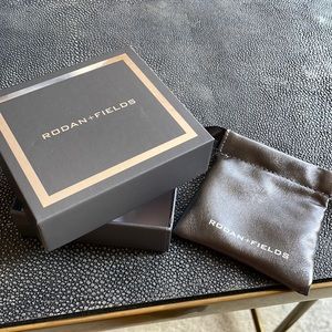 Beautiful Rodan Fields bracelet with # crystals and the Rodan fields name